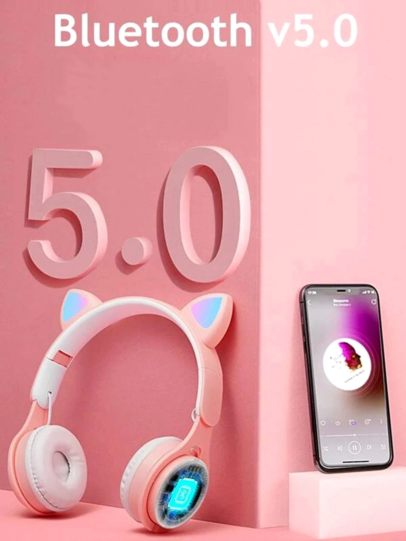 Pink headphones with cat ears and a smartphone displaying Bluetooth connectivity on a pink background